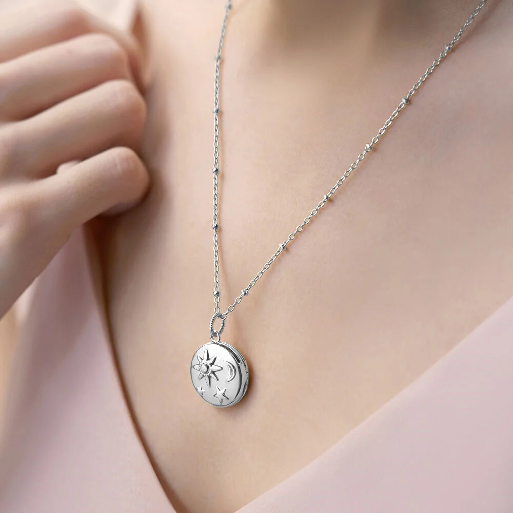 Silver Plated Amy Huberman Newbridge Silverware Locket With Sun Moon & Stars Design - Image 2